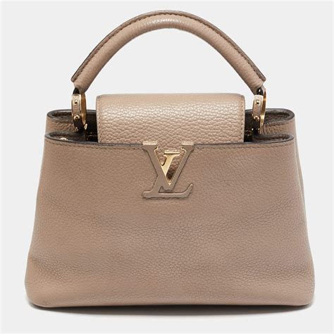 louis vuitton tasje rubber beige|Louis Vuitton handbags.